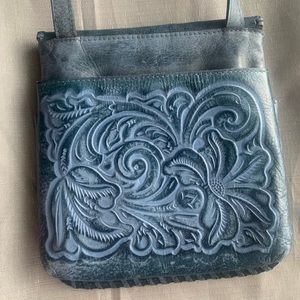 Patricia Nash tooled crossbody bag - blue denim color. Lots of compartments.